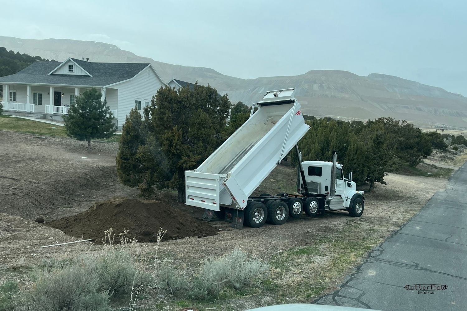 Dump Truck Driver & Truck Services for Utah Butterfield Builders, Llc.